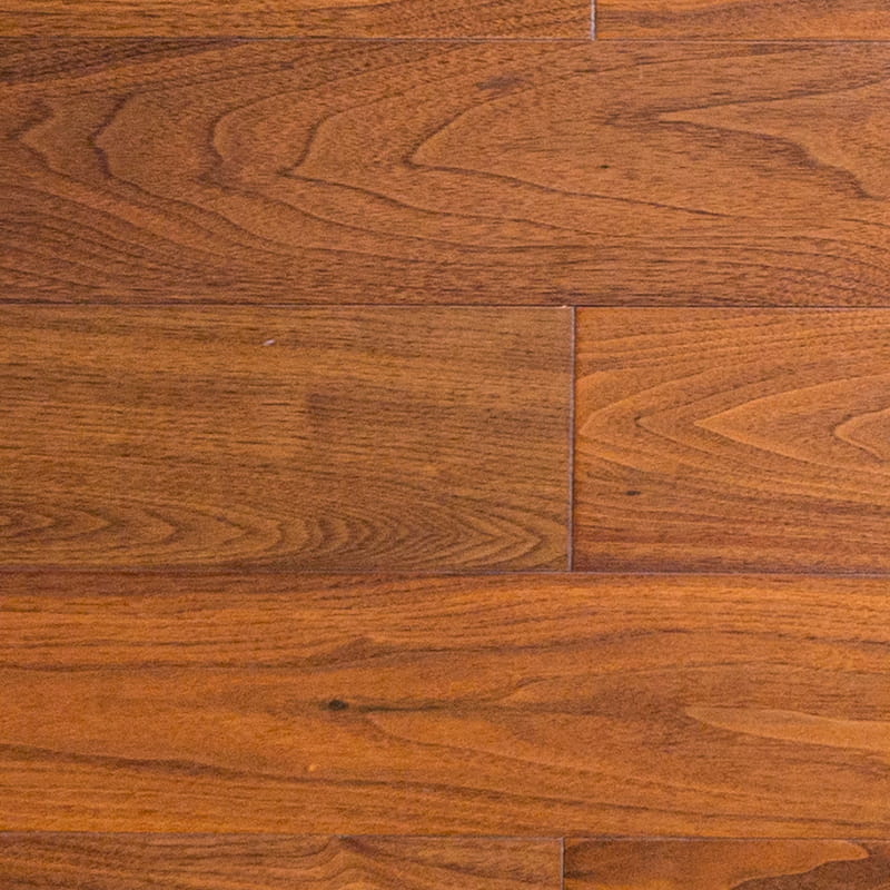 Pavimenti in legno massello tono naturale noce nera